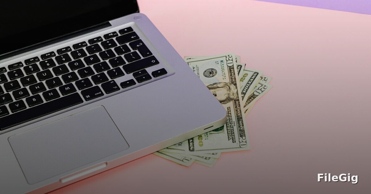 A creator working at a laptop, building an online income stream from digital file sales